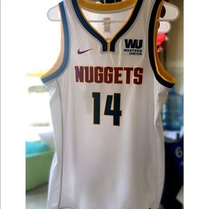 Worn once for a Nuggets game, now no need for it. Excellent condition.